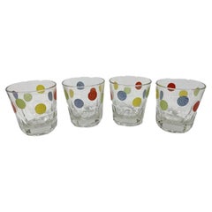 Four Retro Rocks Glasses with Textured Colored Dots over Paneled Bases
