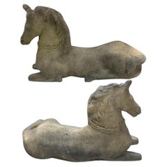 Four Vintage Stone Recumbent Horse Garden Statues.