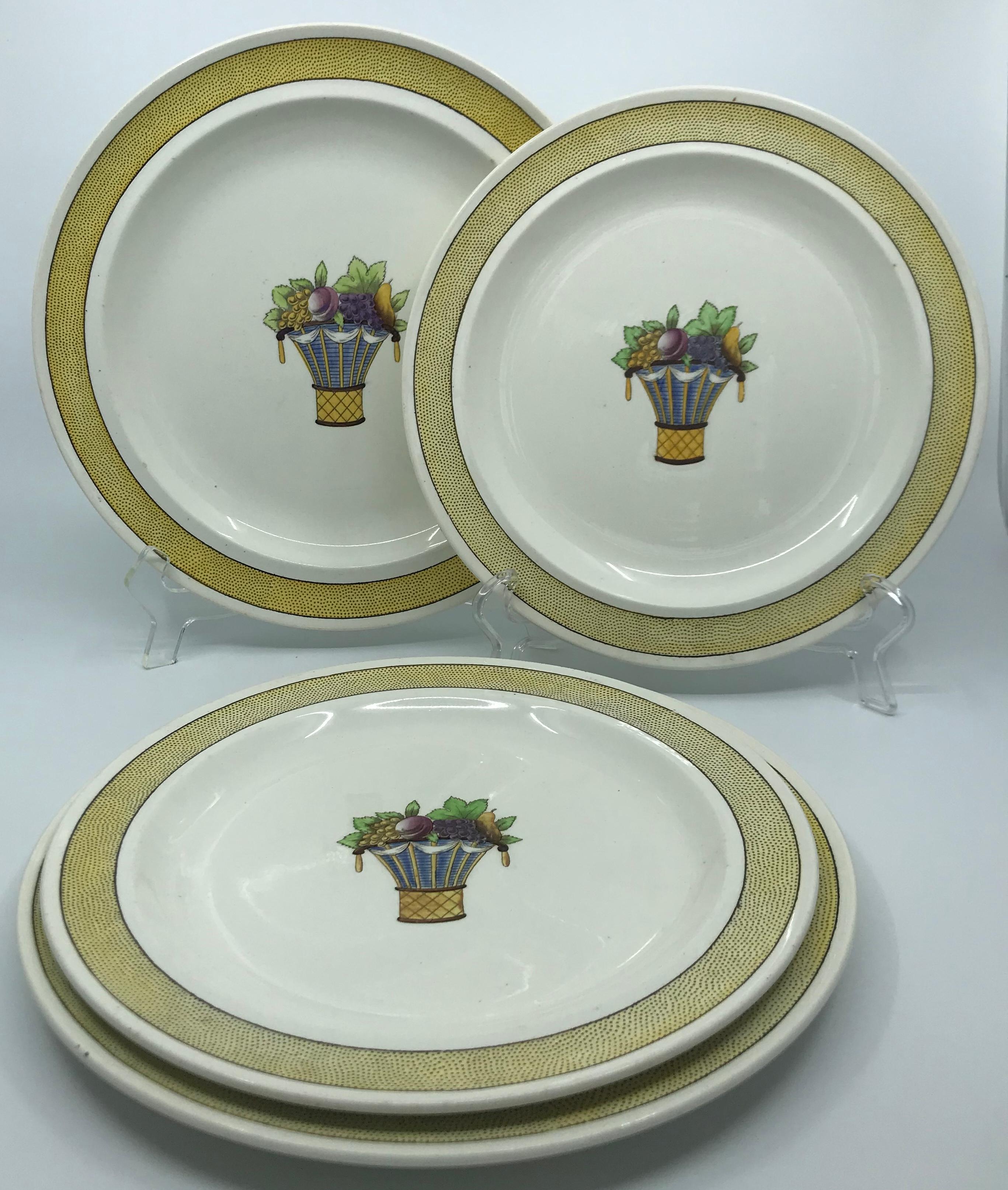 Four vintage Wedgwood Directoire pattern yellow creamware plates. Two dinner plates and two luncheon plates in varying shades of yellow banding with impressed mark for Wedgwood from the 1920’s. England, first quarter twentieth century.
Dimensions: