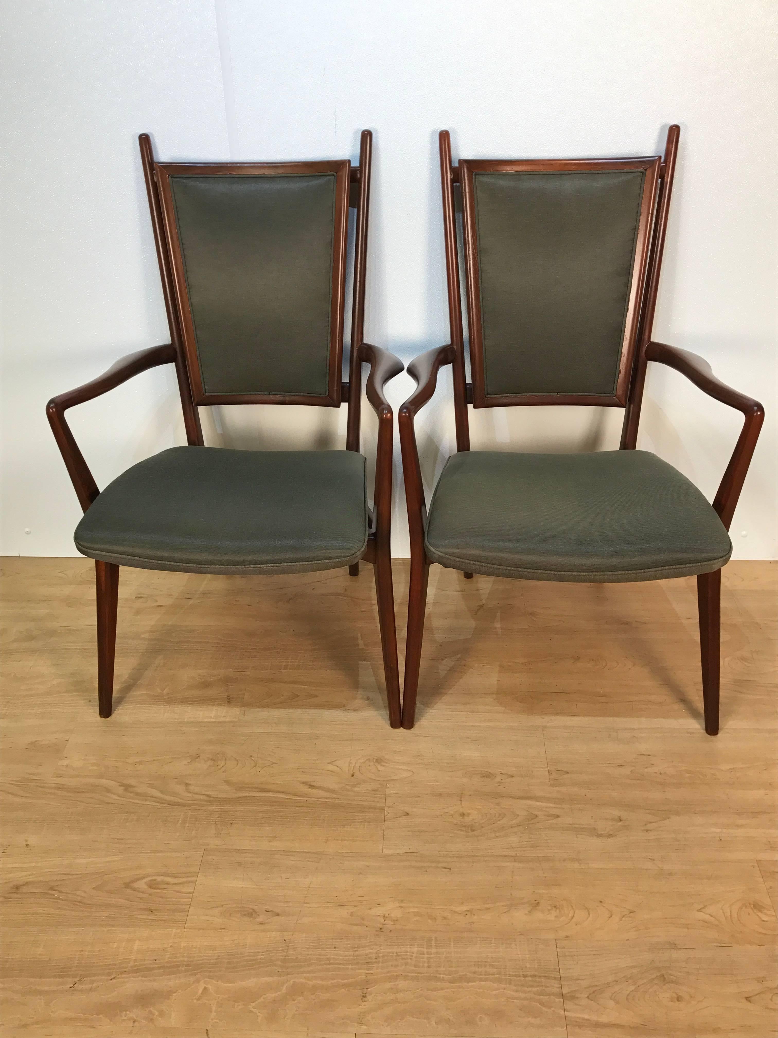 Four Vladimir Kagan dining chairs, by Grosfeld House consisting of two-arm and two side chairs, newly upholstered.
Illustrated with cane seat backs in The Complete Kagan, Tom Ford pages 108 & 109.

Measures: Armchairs: 39.5 in H x 24 in W x 24 in