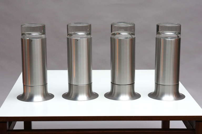 Four wall lights produced by the Amsterdam-based RAAK during the 1970s. Aluminium housing and holds one bulb.
These vintage lamps are a typical example of 1970s Dutch lighting, which widely used materials as glass, and light metal aluminium