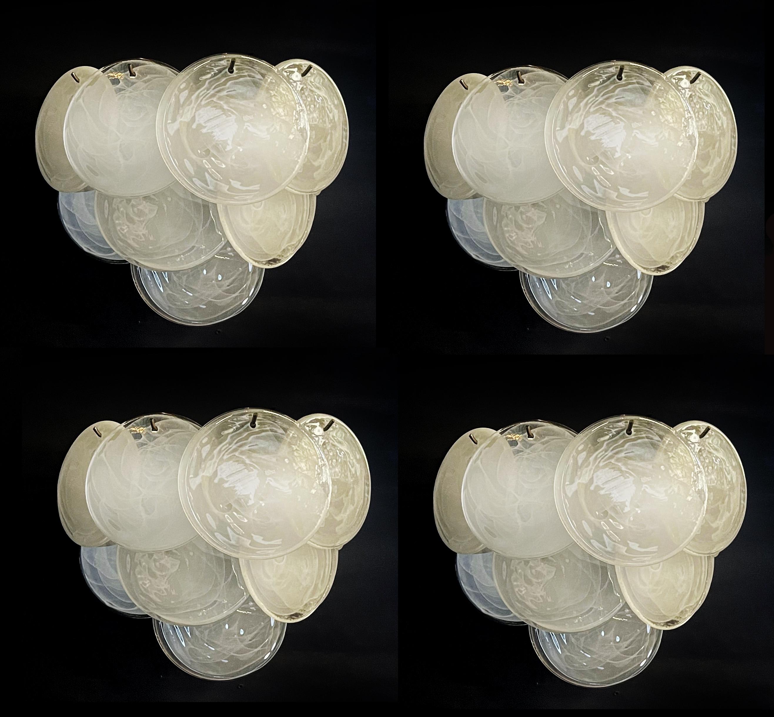 Four Vintage Italian Murano sconces in Vistosi style. Wall lights have 10 alabaster iridescent glasses for each. Nickel metal frame.
Period: late XX century
Dimensions:11 inches (28 cm) height; 13,40 inches (34 cm) width; 7,10 inches (18 cm) depth