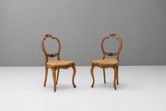 Four Walnut Side Chairs
