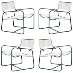 Four Walter Lamb for Brown Jordan Lounge Chairs and One Ottoman