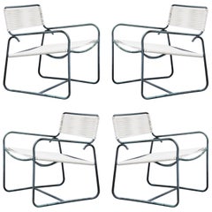 Four Walter Lamb for Brown Jordan Lounge Chairs and One Ottoman