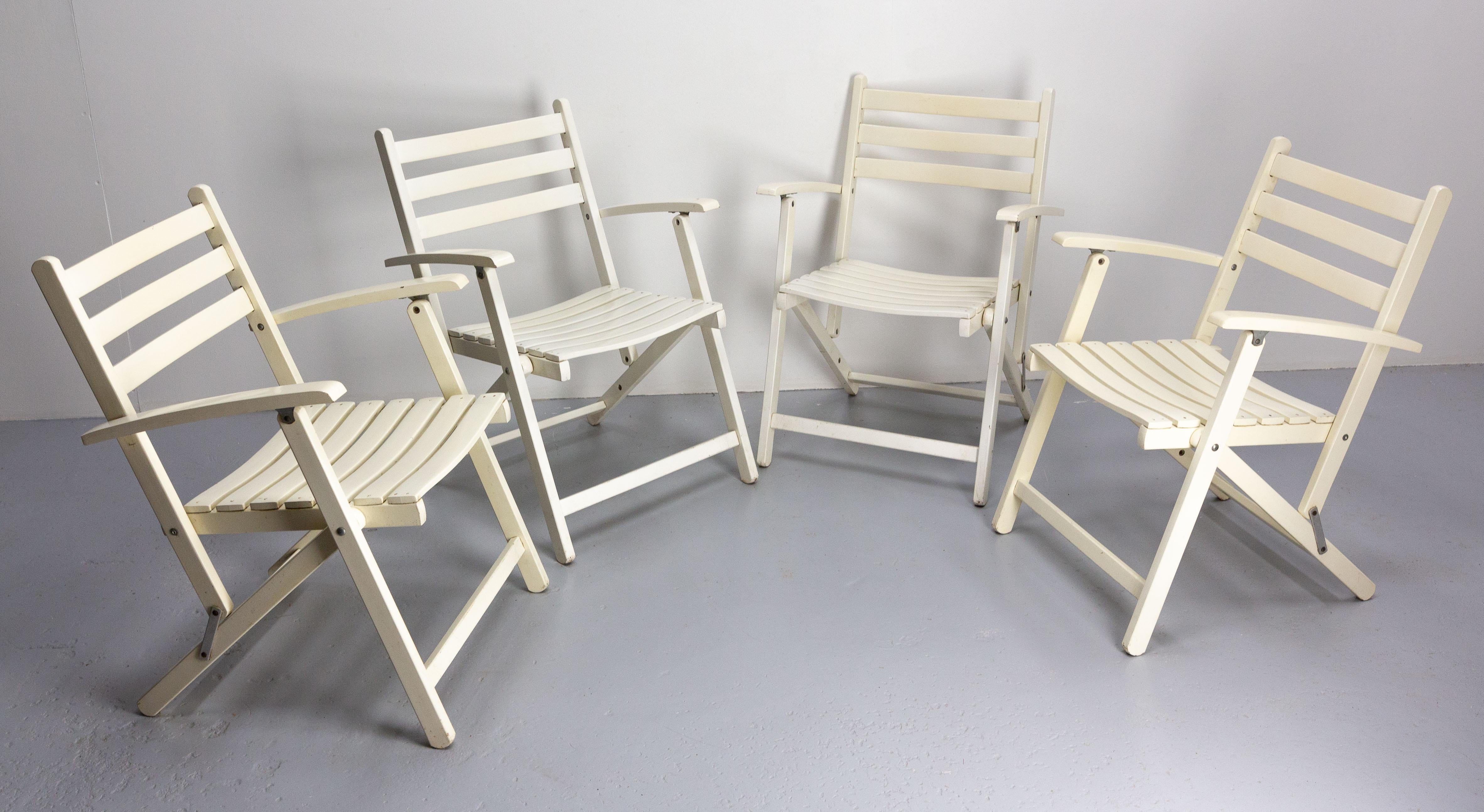 Three dining chairs for home, patio or garden by Dejou
1970s French folding chairs
Dejou enterprise is a maker of furniture for patios, gardens, home and wooden toys since 1872 in the South of France.
Good condition

Shipping:
57.5 / 83.5 /P 40 cm