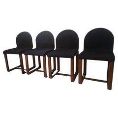 Four wooden and leather chairs in the 1960s Afra & Tobia Scarpa style