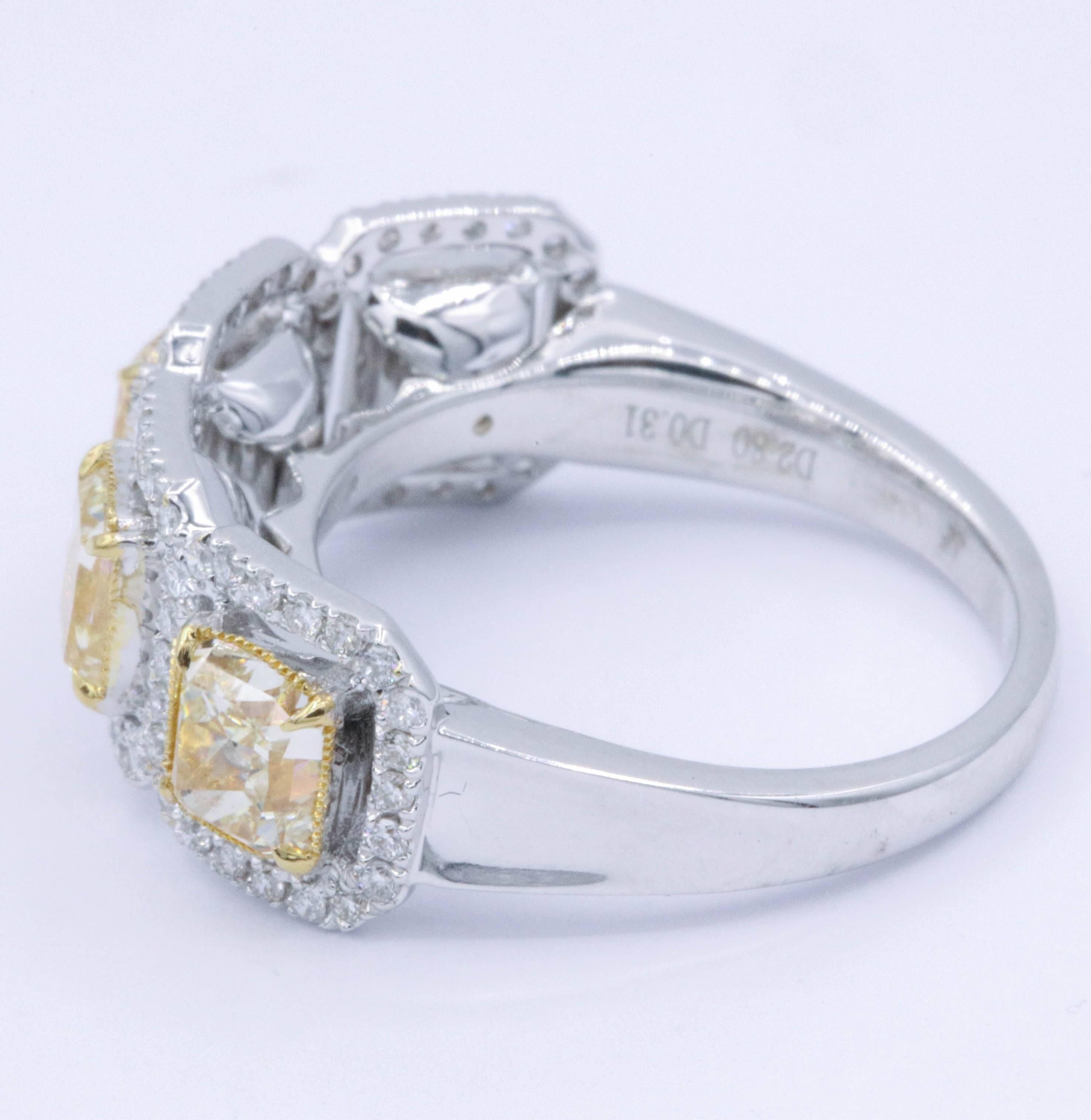 Contemporary Four Yellow Diamonds Square Radiant and Diamonds Cocktail Ring