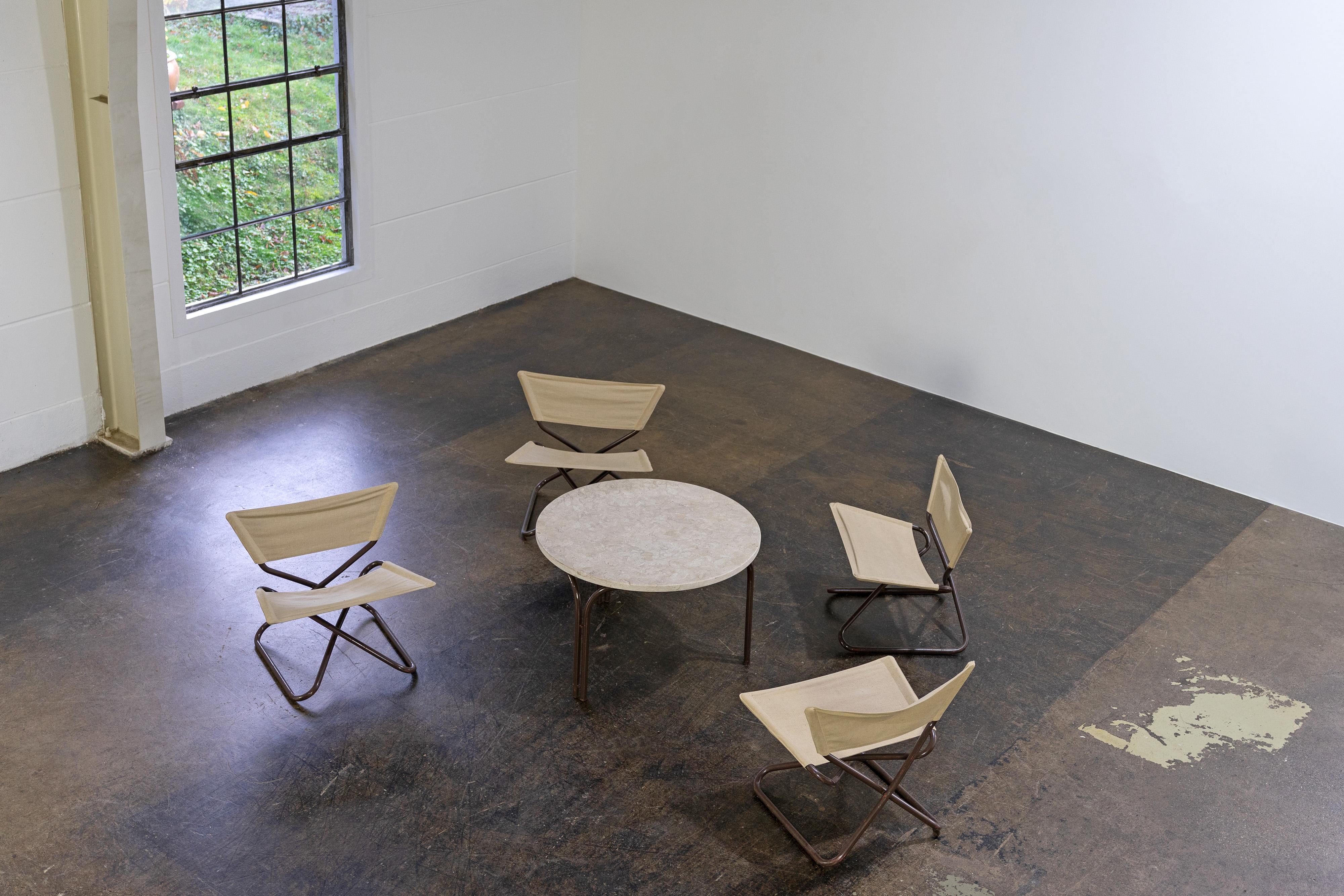 Danish Four Z-Down folding lounge chairs and table by Erik Magnussen, Torben Ørskov For Sale