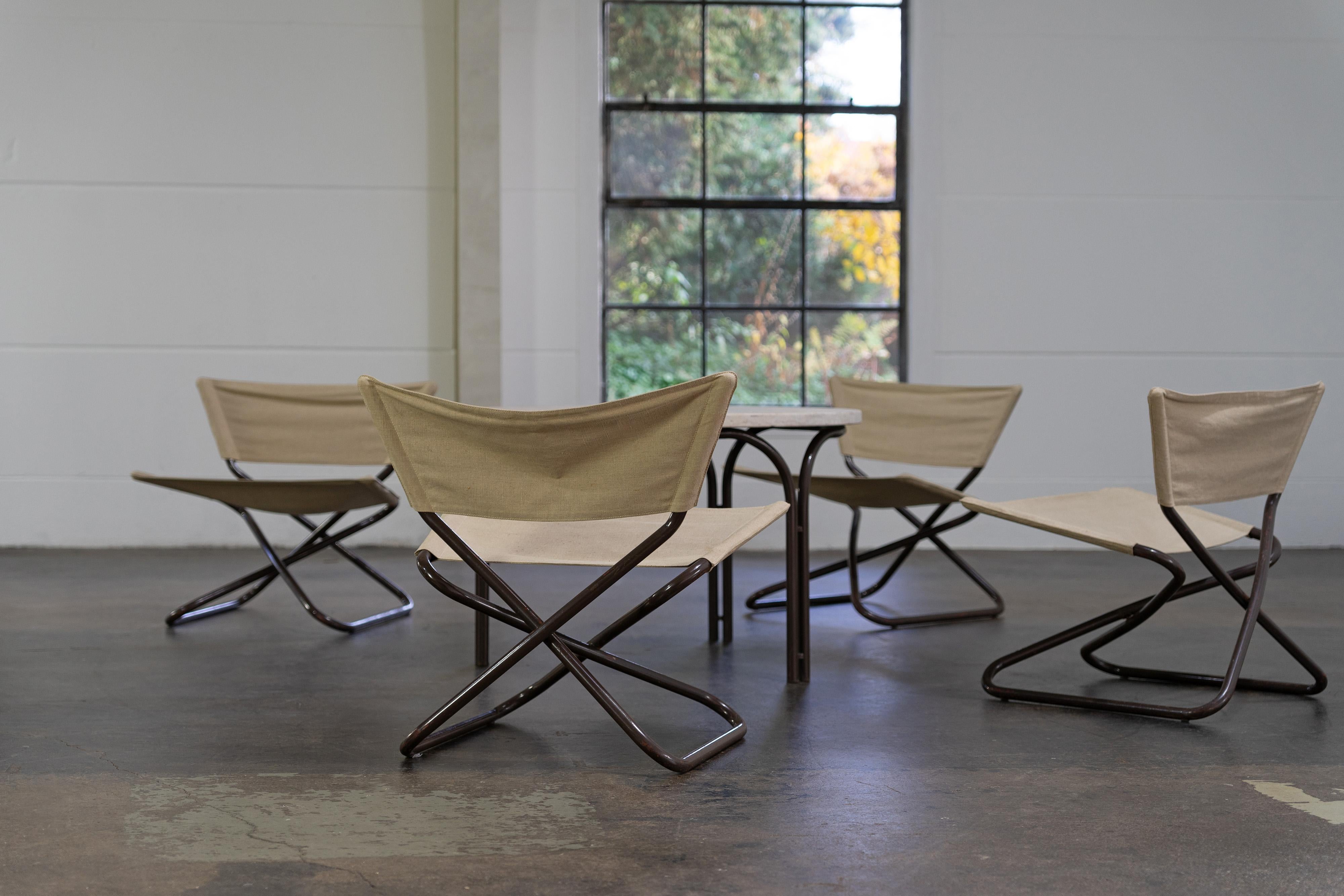 Four Z-Down folding lounge chairs and table by Erik Magnussen, Torben Ørskov In Good Condition For Sale In Rosendahl, DE