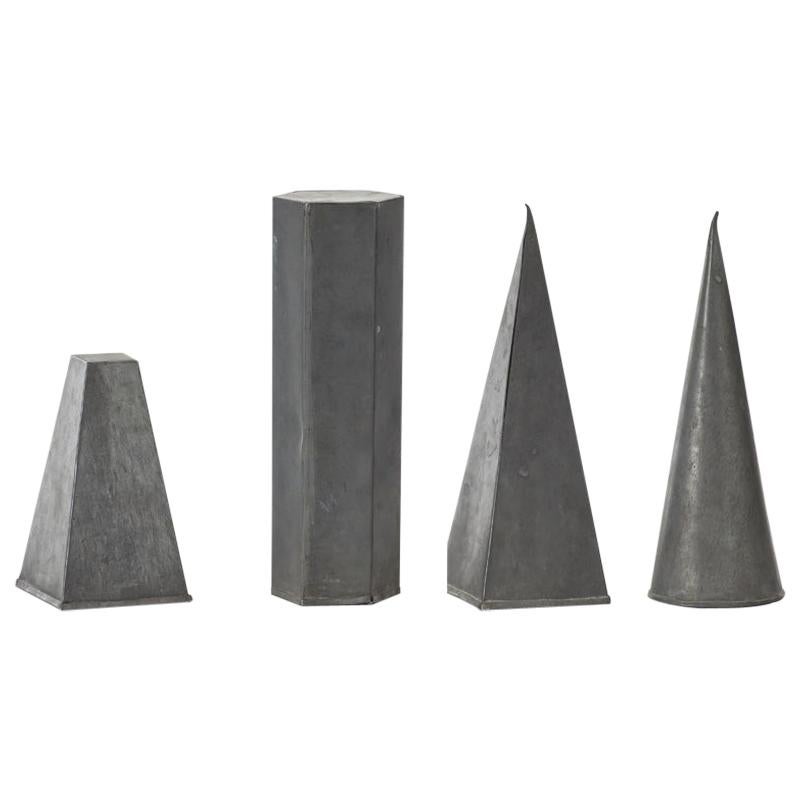 Four Zinc Geometric Shapes, UK, circa 1950