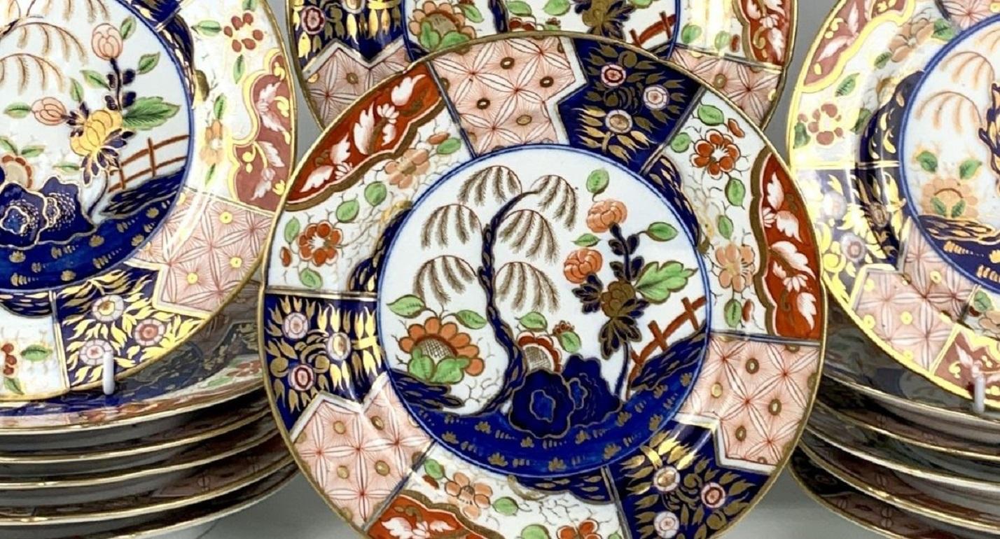 We are proud to offer this set of fourteen Coalport Money Tree pattern plates. This fabulous Coalport pattern is also known as the Rock and Tree pattern. It is one of the very best of the Regency period porcelain patterns. The color combinations are