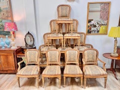 Fourteen Italian Louis XVI period laccatura dining chairs, 18th c.