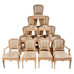 Fourteen Italian Louis XVI period laccatura dining chairs, 18th c.
