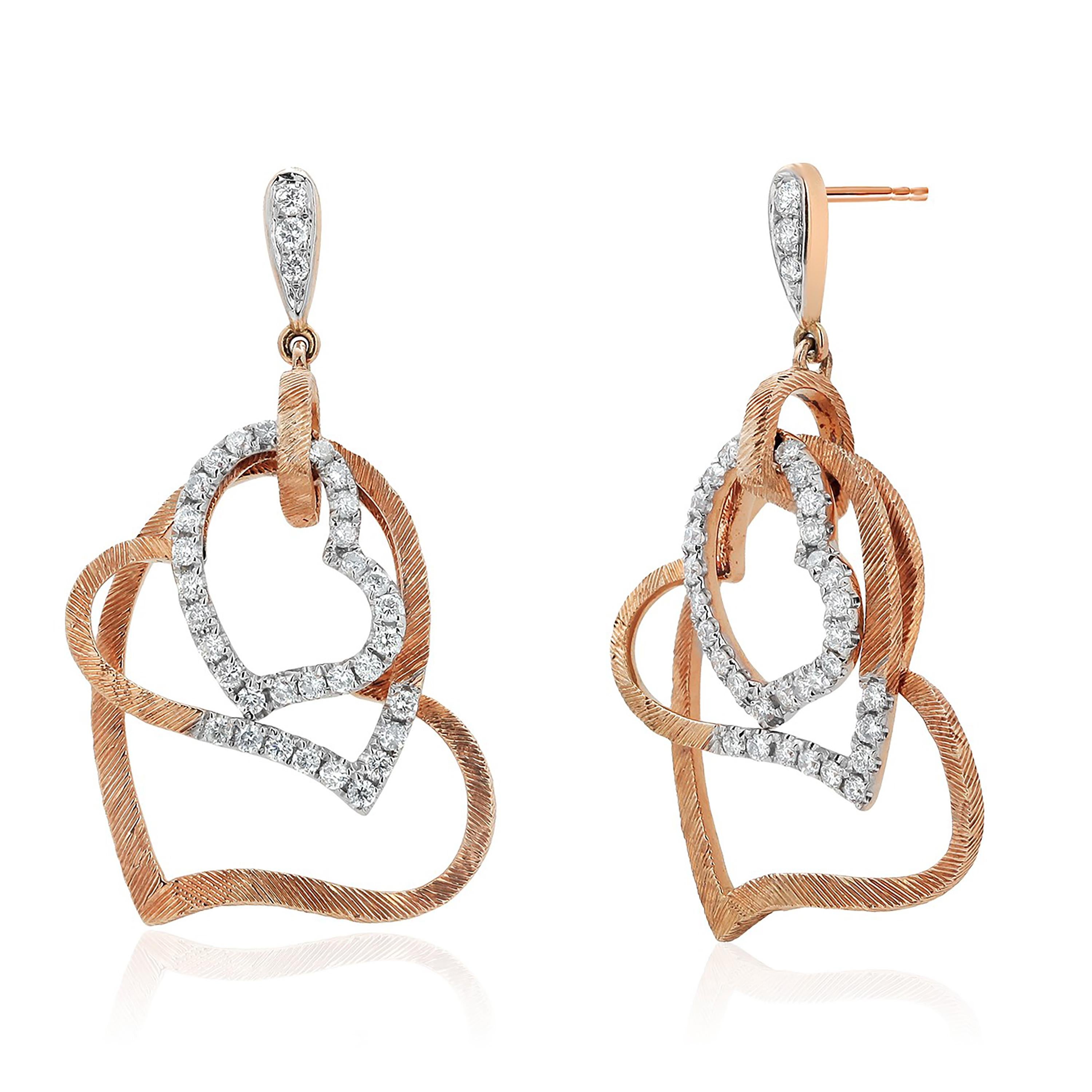 Women's Fourteen Karat White and Rose Gold Vintage Three Diamond Hanging Heart Earrings