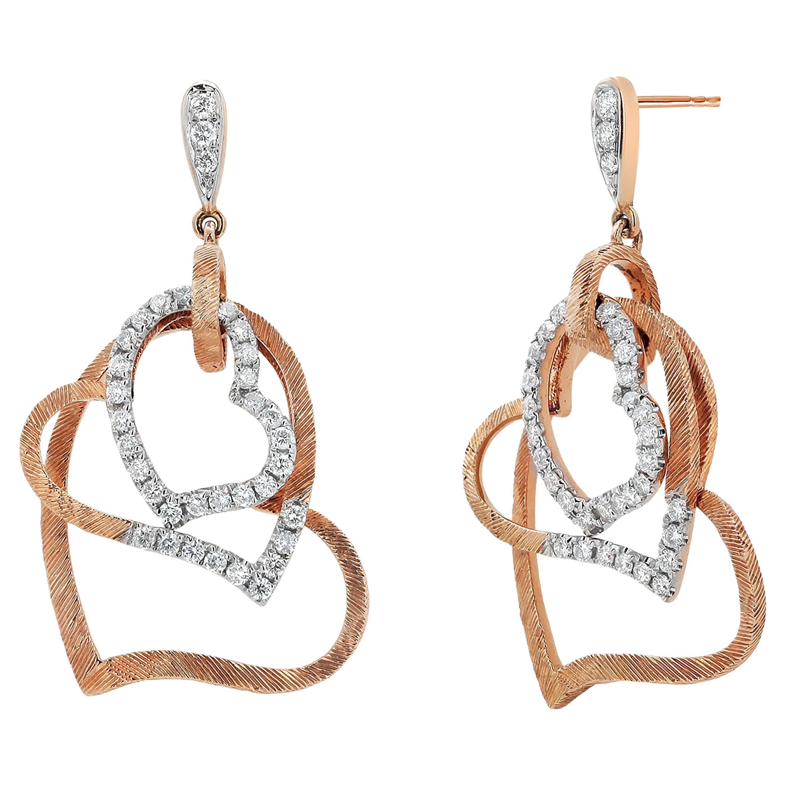 Fourteen Karat White and Rose Gold Vintage Three Diamond Hanging Heart Earrings