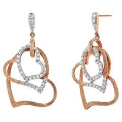 Fourteen Karat White and Rose Gold Vintage Three Diamond Hanging Heart Earrings