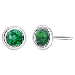 Fourteen Karat White Gold Four Millimeter Round Emerald Bezel Set Stud Earrings