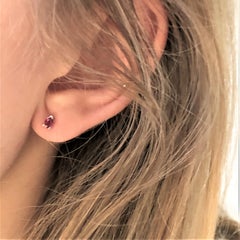 Fourteen Karat White Gold Pear Shape Ruby Stud Earrings