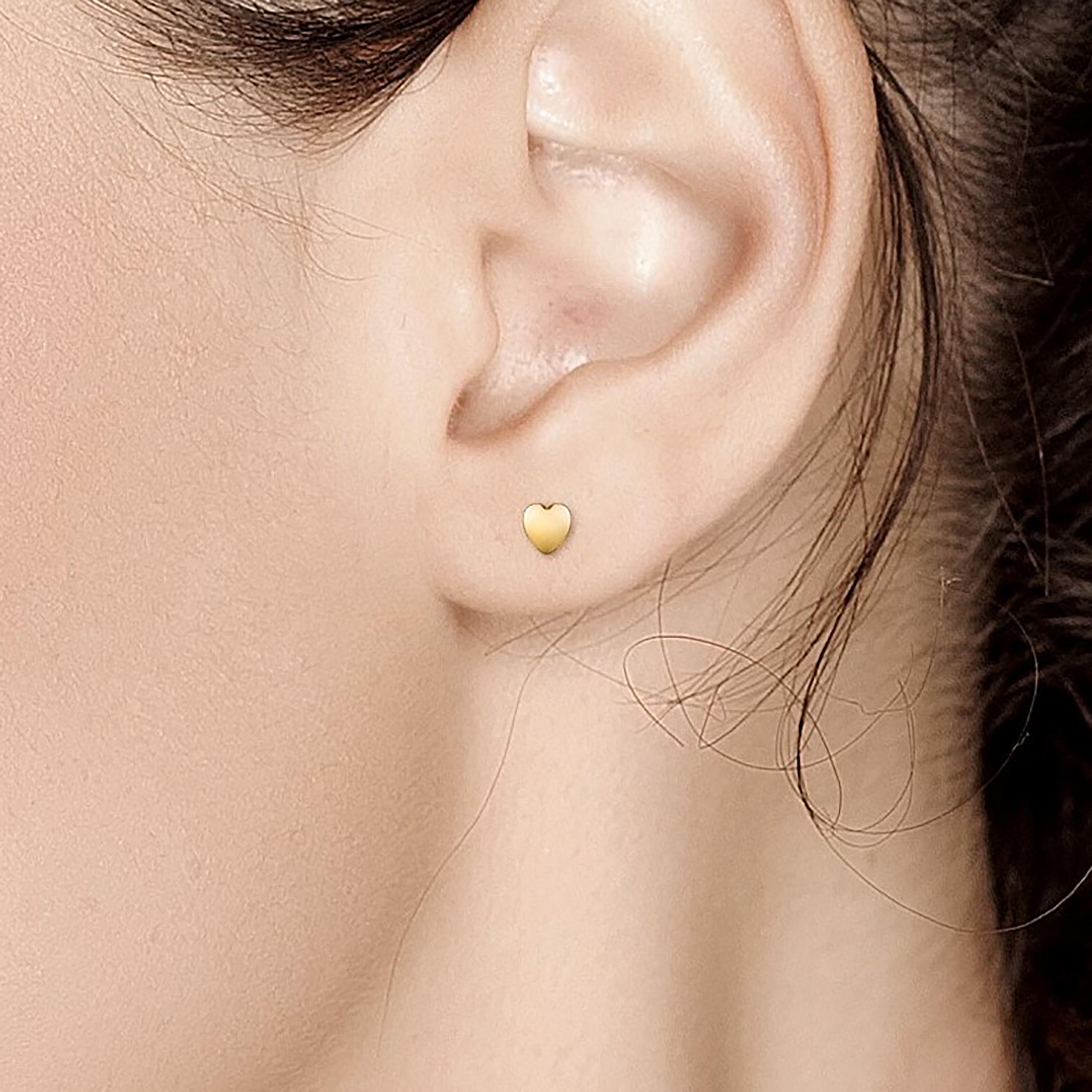 Fourteen karats yellow gold 4-millimeter heart shape stud earrings
Heart shape studs measuring 0.16 inch
New Earrings
Handmade in USA
