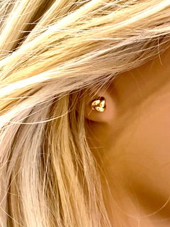 Fourteen Karats Yellow Gold Love Knot 0.30 Inch Stud Earrings