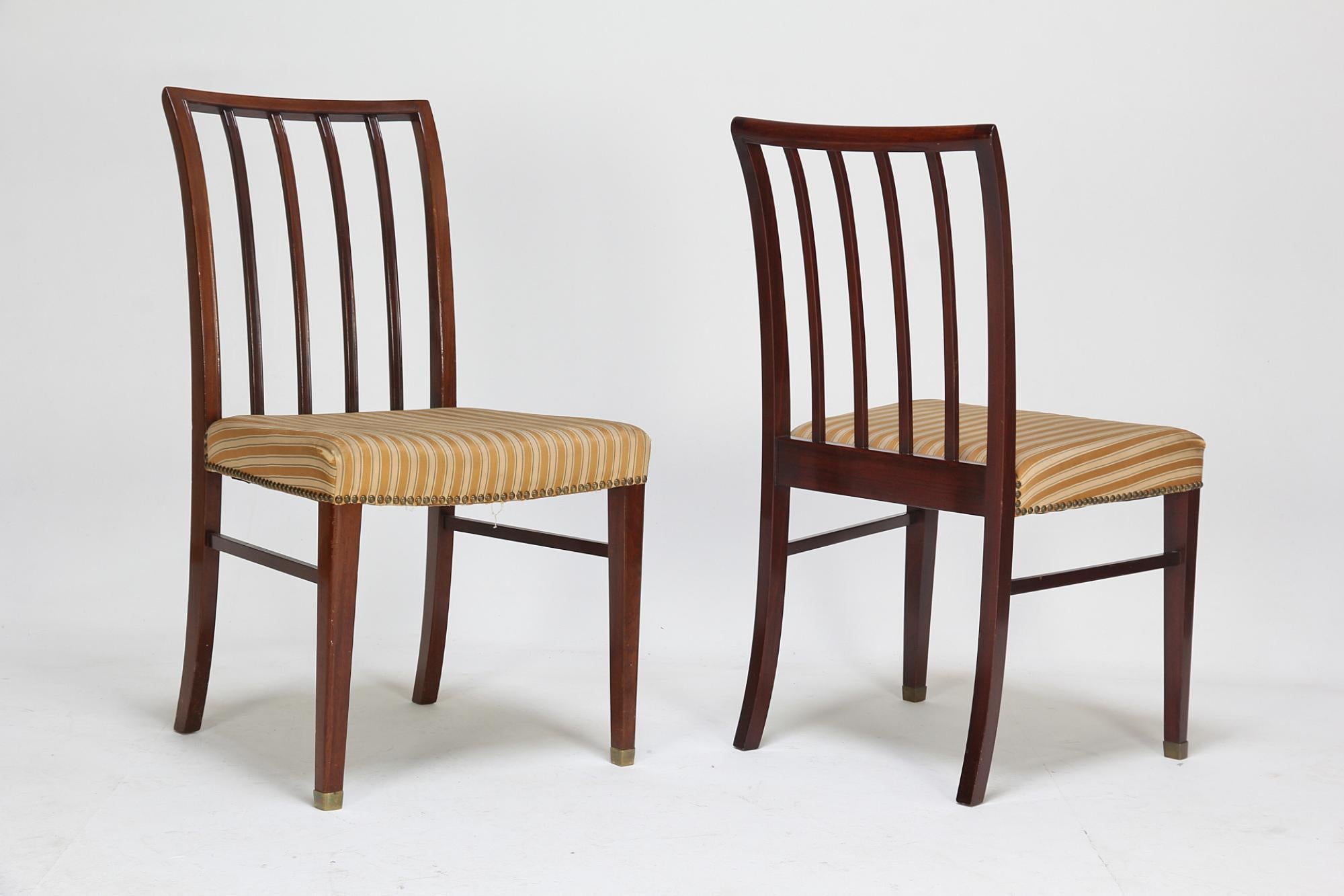 Scandinavian Modern Fourteen Mahogany Dining Chairs