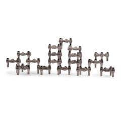 Fourteen Original Nickel-Plated Variomaster Candleholders
