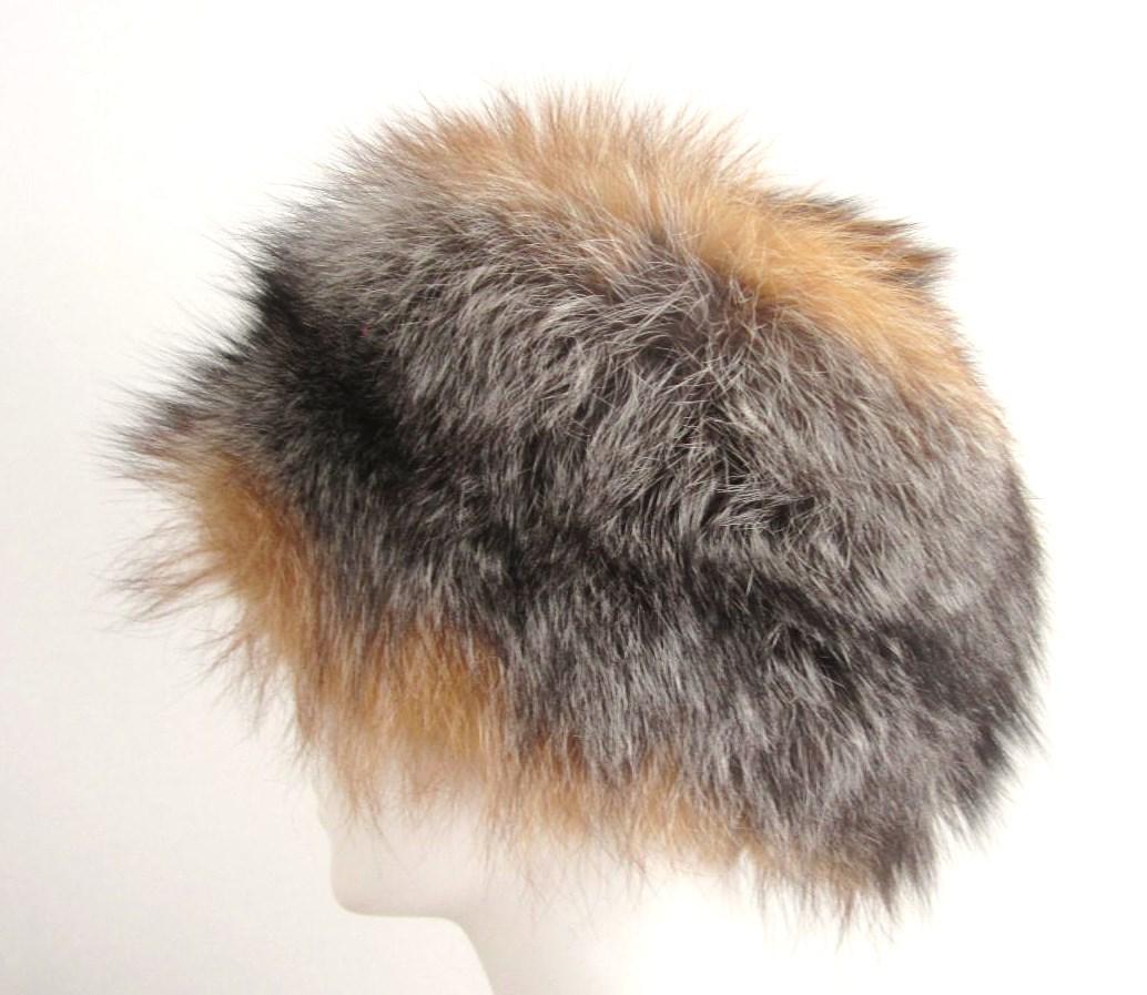 Fox Fur hat. Combination of Red and SIlver fur.  This is a 22.5 in. Soft and supple  We have more fox hats listed.  Please be sure to check our storefront for more furs from Mink, Fitch, Fox and Lamb. We also have hundreds of pieces of jewelry from