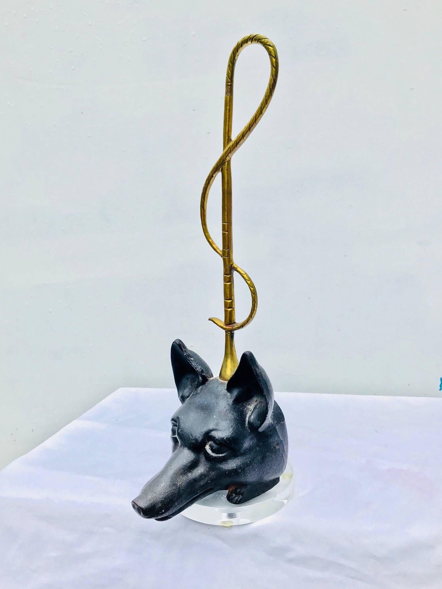 A whimsical cast iron fox head doorstop from Virginia Metalcrafters circa 1980. The collectible piece is an East Coast decorating necessity.