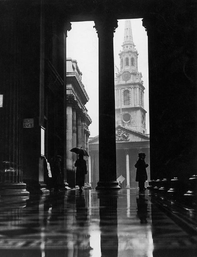 "Inside St Stephen's" by Fox Photos

February 1928: People sheltering from the rain under the portico of the National Gallery in London. The church of St-Martin-in-the-Fields can be seen in the background.

Unframed
Paper Size: 24" x 20''