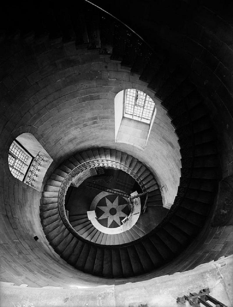Fox Photos/Getty Images Black and White Photograph - "Spiral Staircase" by Fox Photos