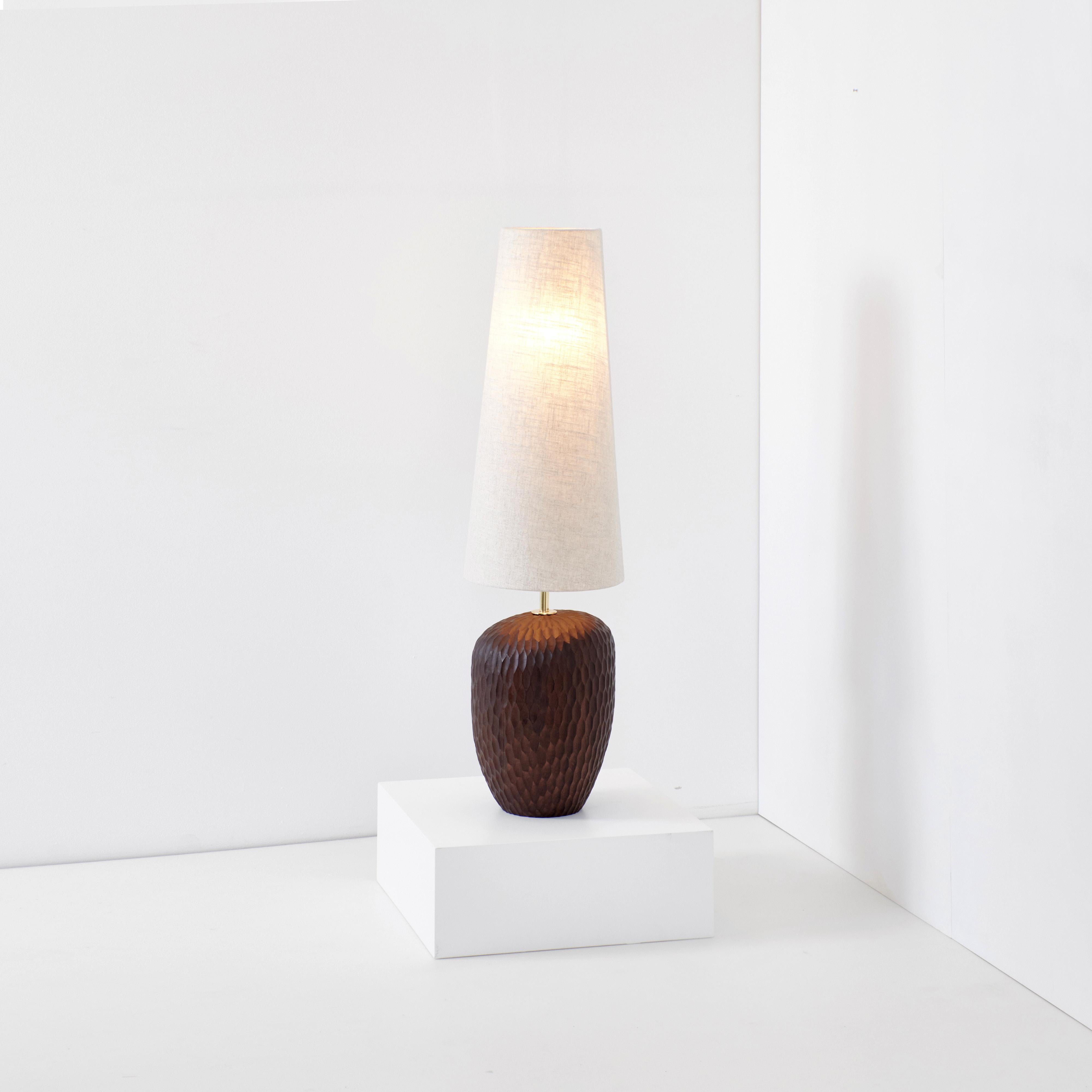 Foz in white, designed in 2024.

Large artisanal floor light with an organic shape, carved from solid wood in Project 213A's own workshop. Each piece is unique due to its handmade nature, shapes and shades vary slightly. Bespoke dimensions and