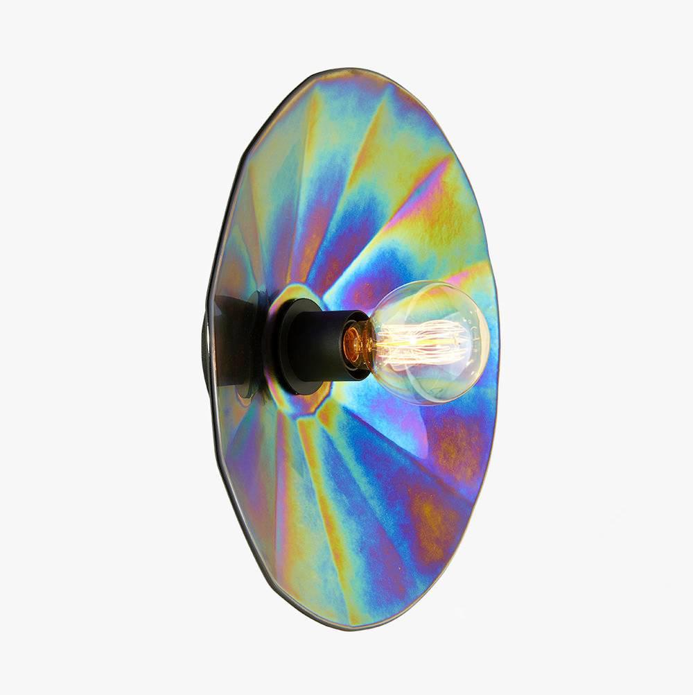 Iridescent thermoformed glass mounted on a base available in lacquered black metal or solid oak. 
Can be used as a wall or ceiling light.
Handmade in Europe 

Available in two sizes:
Large 27.6 in. diameter x 5.9 in. deep
Medium 15.75 in.