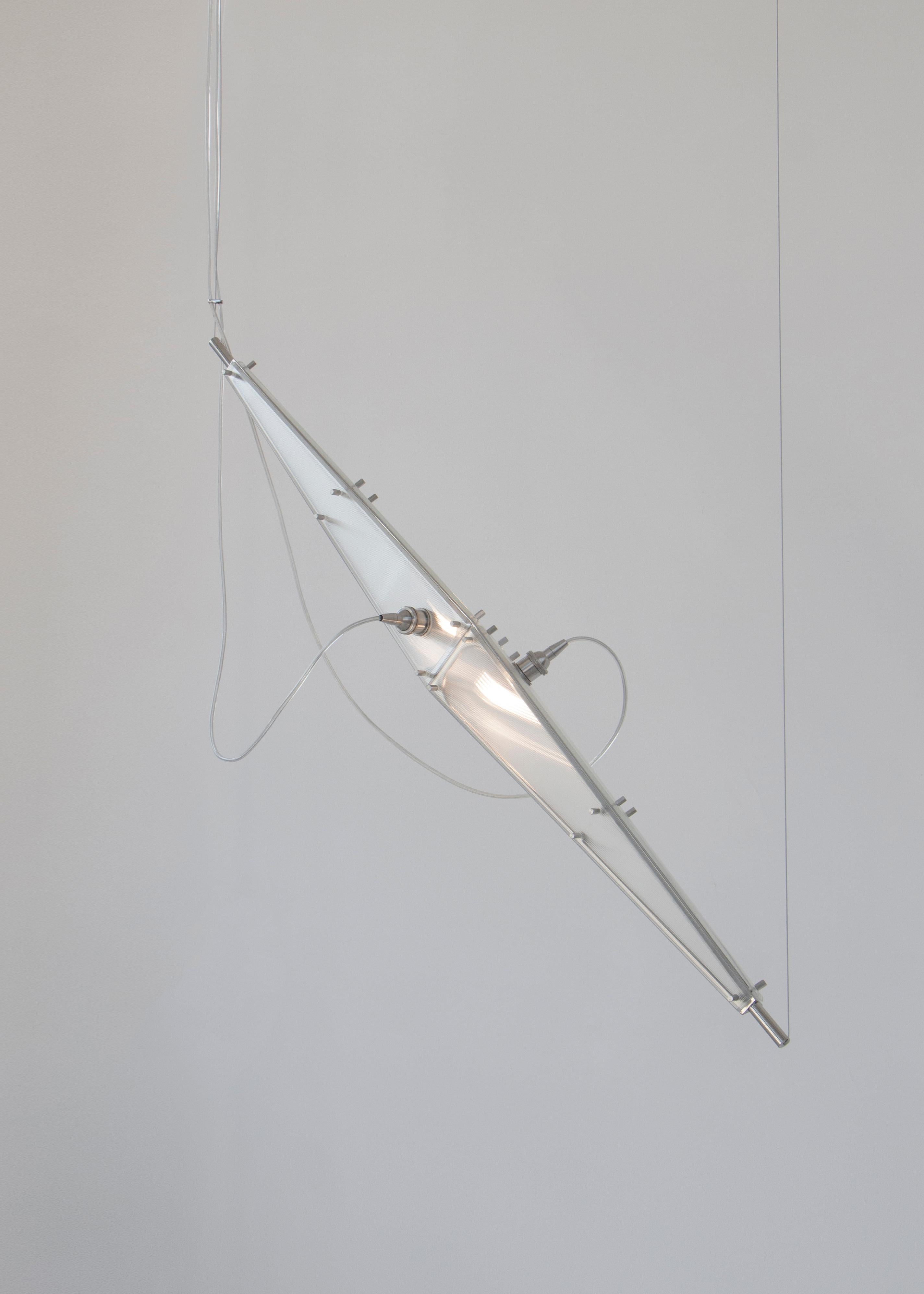 Fragment 02 pendant by Sing Chan 
Dimensions: W 19 x D 11.5 x H 128 cm
Materials: Stainless steel, glass.

All our lamps can be wired according to each country. If sold to the USA it will be wired for the USA for instance.

Under the cross-influence
