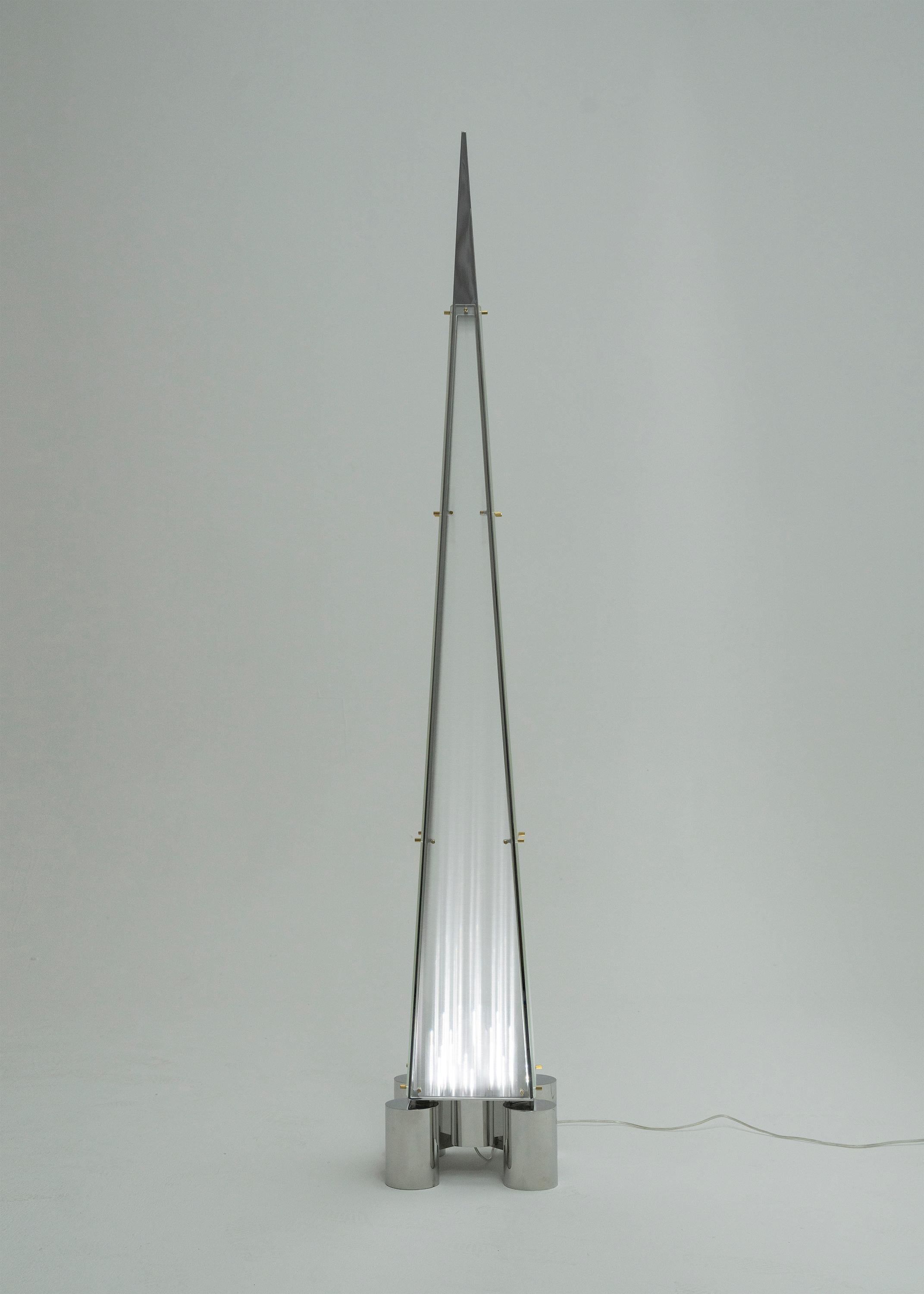 Fragment 03 floor lamp by Sing Chan 
Dimensions: W 32 x D 32 x H 206 cm
Materials: Stainless steel, glass.

All our lamps can be wired according to each country. If sold to the USA it will be wired for the USA for instance.

After passing through