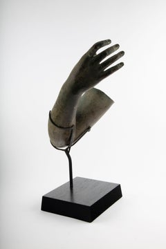 Fragment of a Bronze Arm: Mounted Green-Patinated Bronze Sculpture
