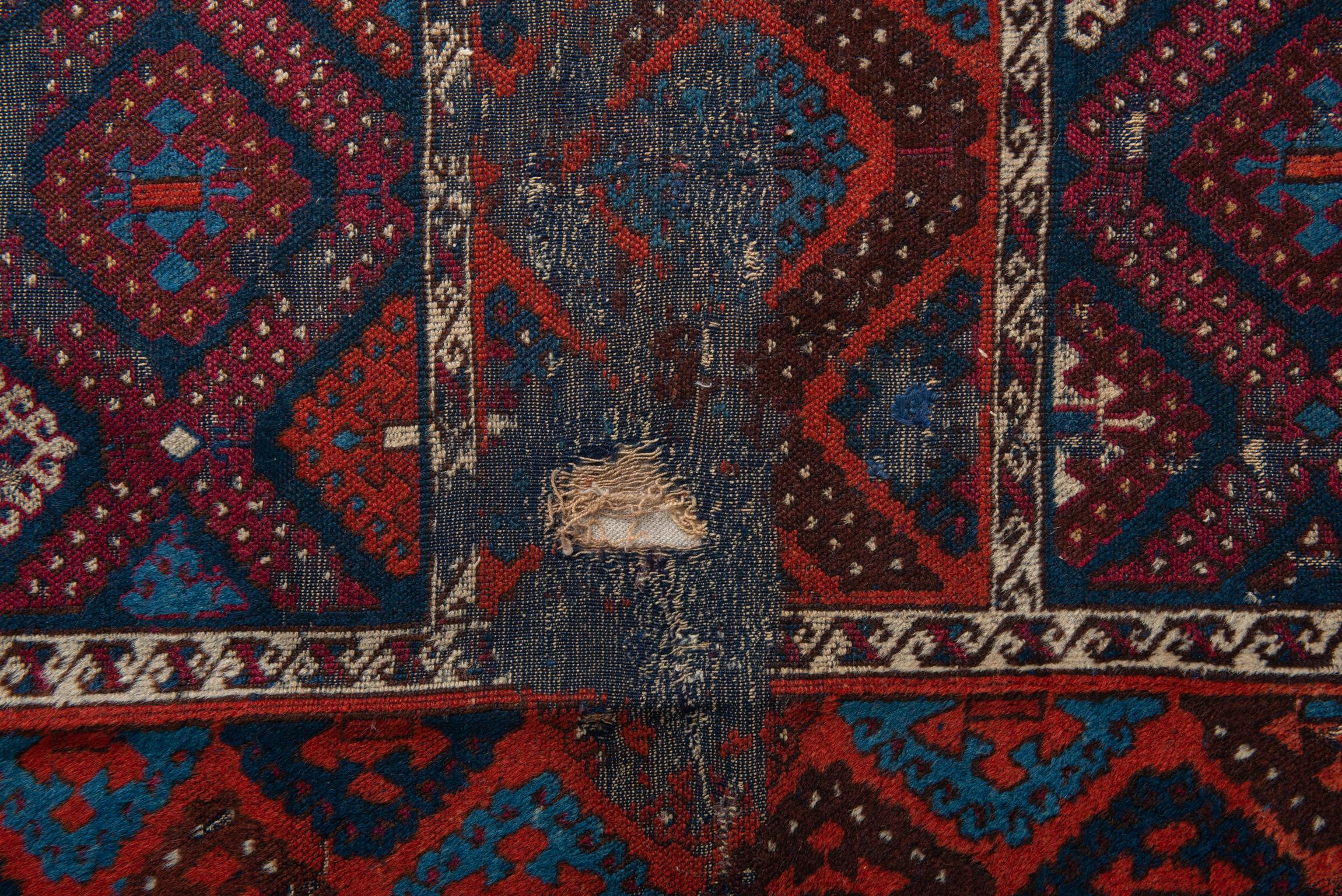 Fragment of Ancient Nomadic Carpet from Kurdestan For Sale 1
