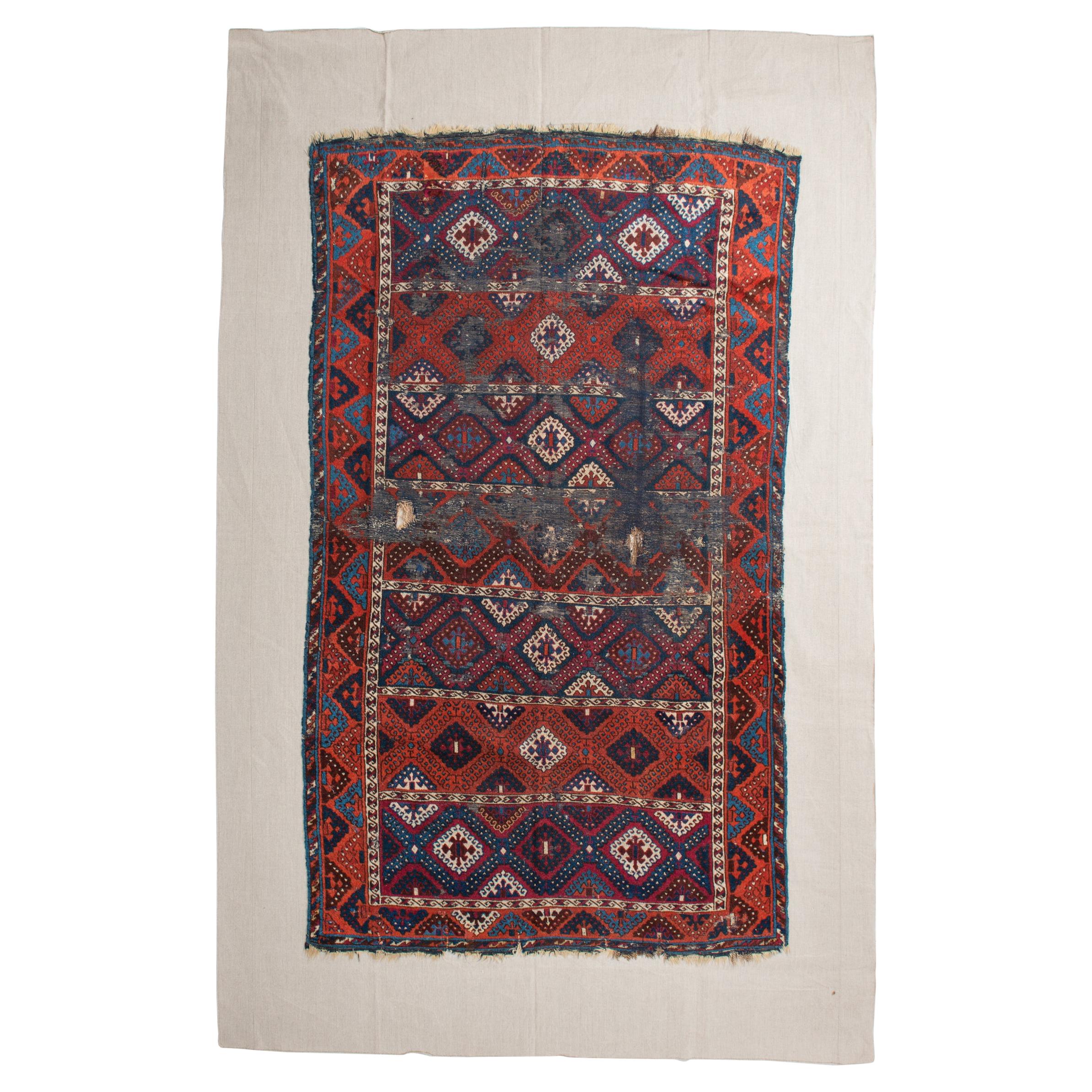Fragment of Ancient Nomadic Carpet from Kurdestan For Sale