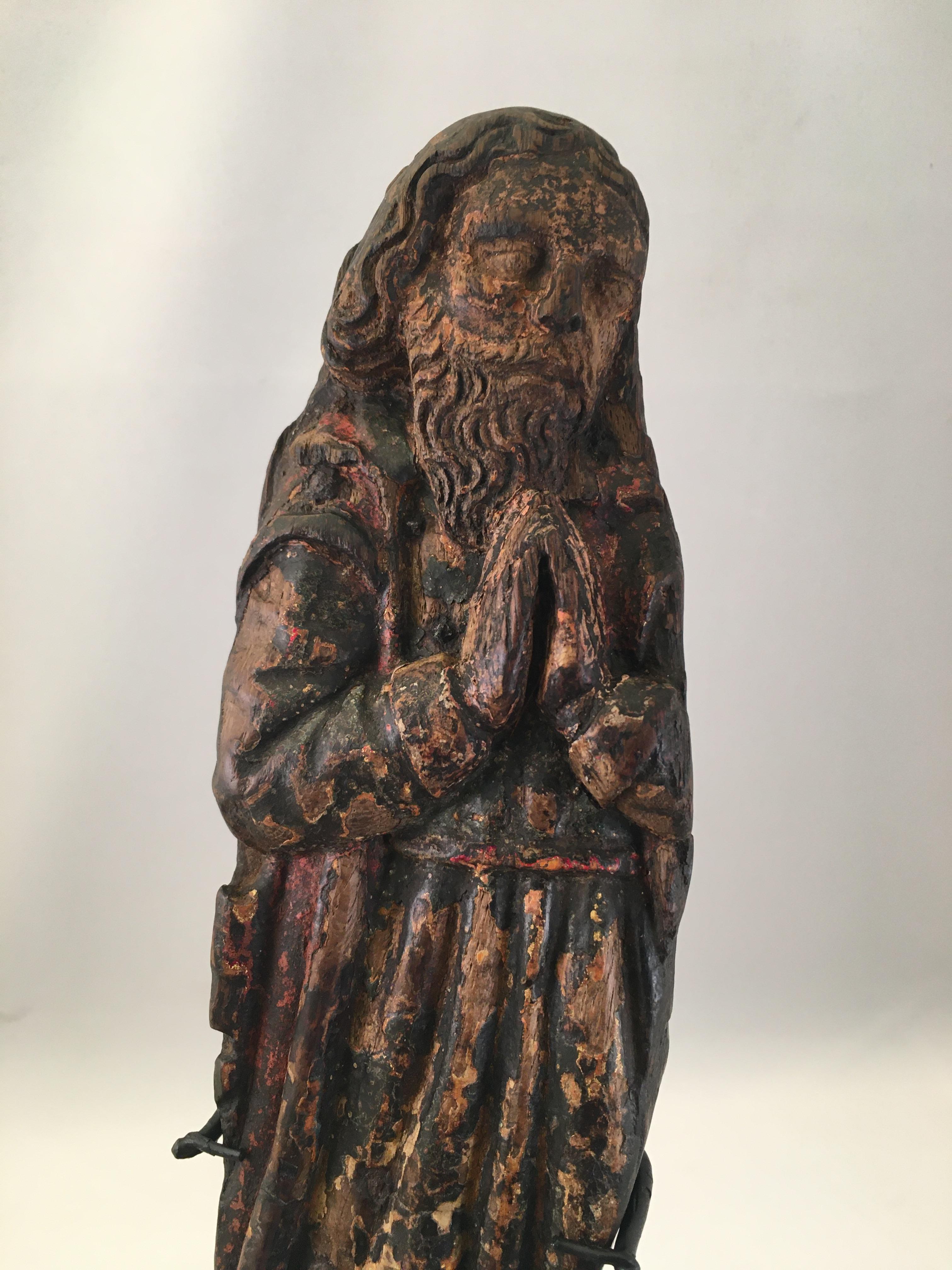 Carved Fragment with Remains of Original Polychrome from a Male Saint France circa 1500 For Sale