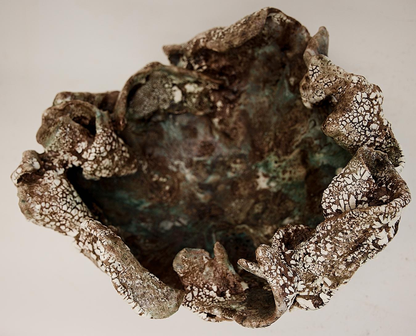 Found like an ancient relic.. created from found clay slabs throughout the studio.
Glazed and finished in old world - deep earth toned glaze mix of color and texture .
 
 
 
 
This hand made ceramic vase or bowl for interior design showcases a