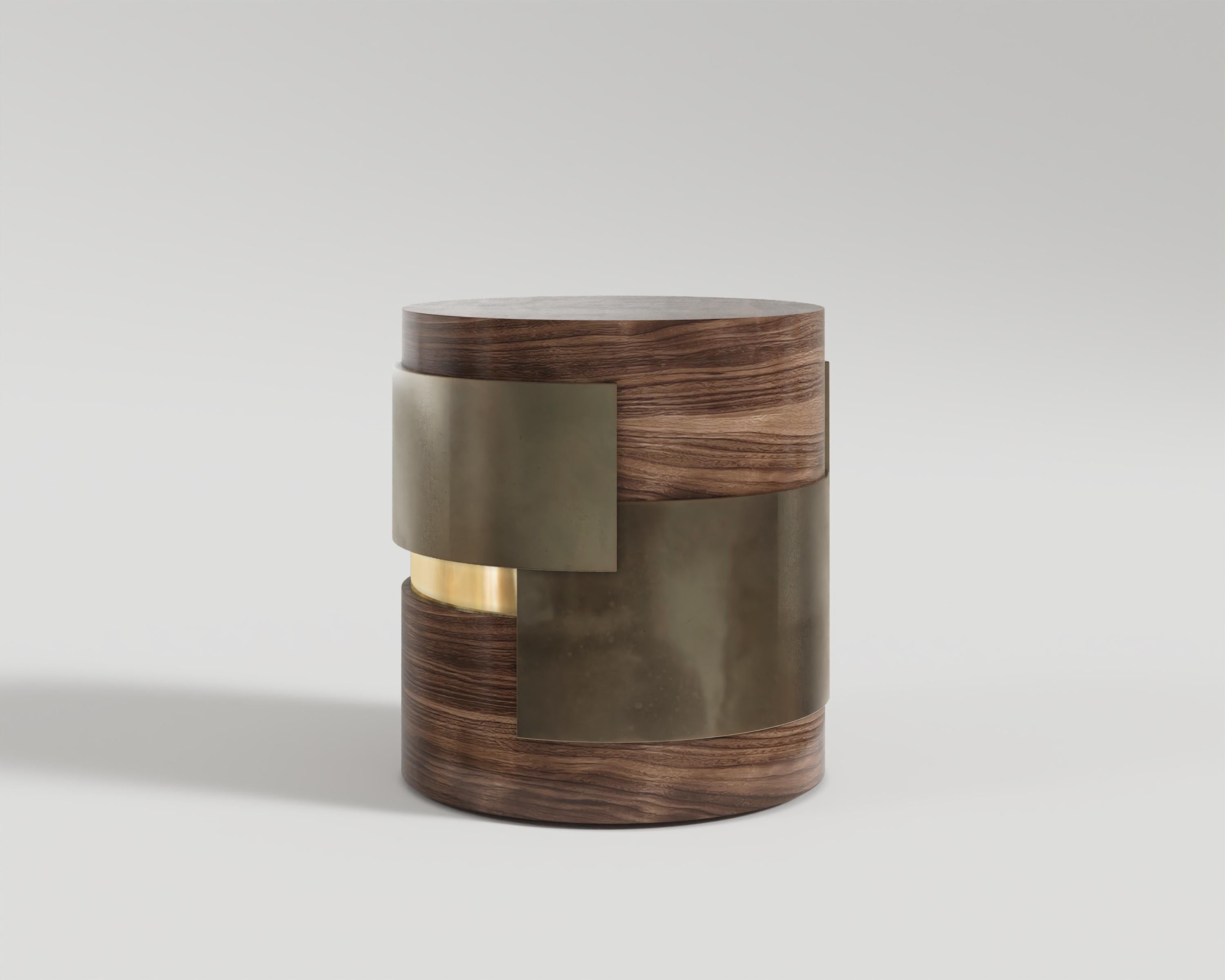 Fragmin Side Table
Elegant luxury Fragmin side table featuring a sleek cylindrical design, crafted with black lacquer, bronze accents, and rich veneer materials for a timeless and opulent aesthetic.

Materials and sizes are customizable upon the