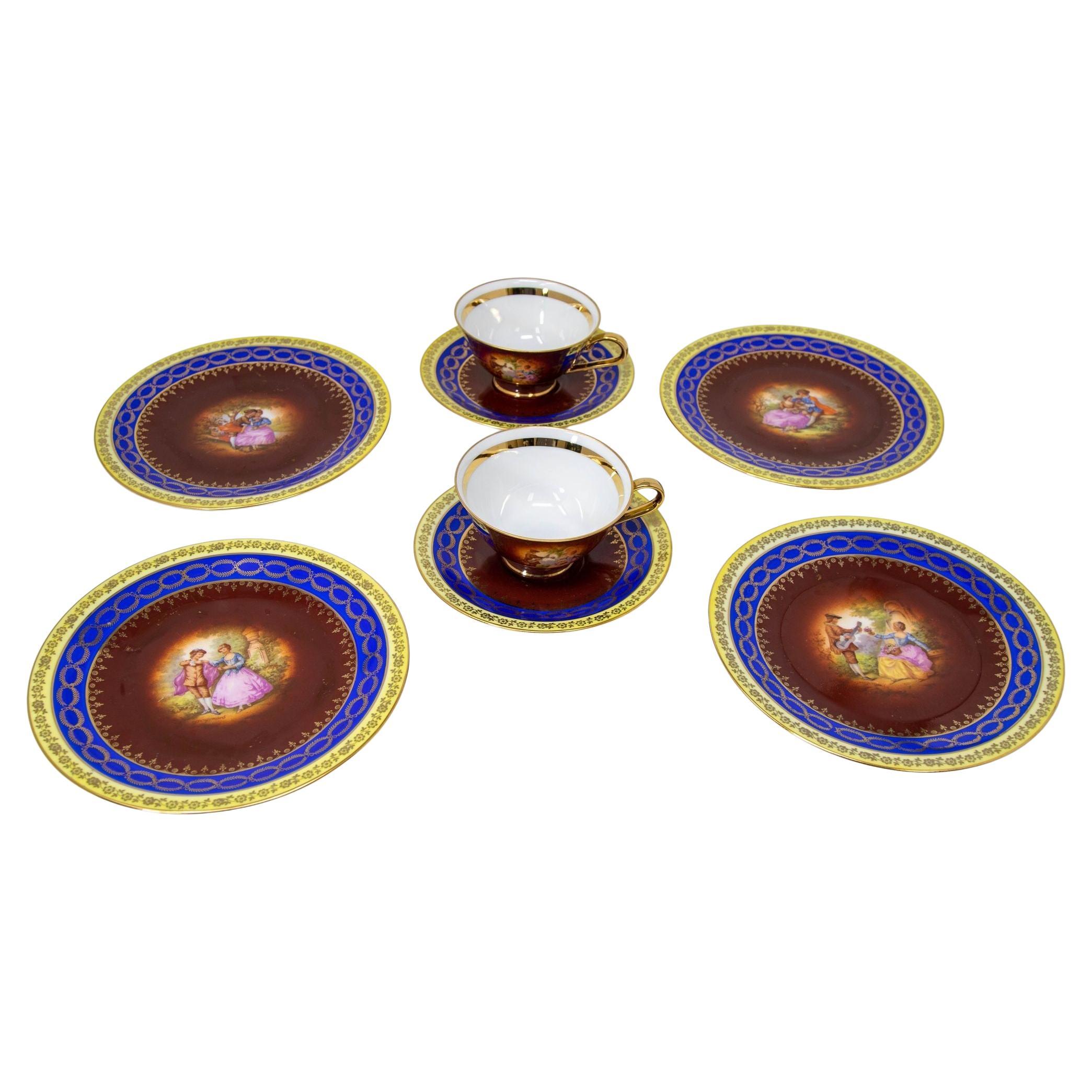 Fragonard Porcelain Hand Painted Matched Porcelain Cabinet Cup and Saucer Set For Sale