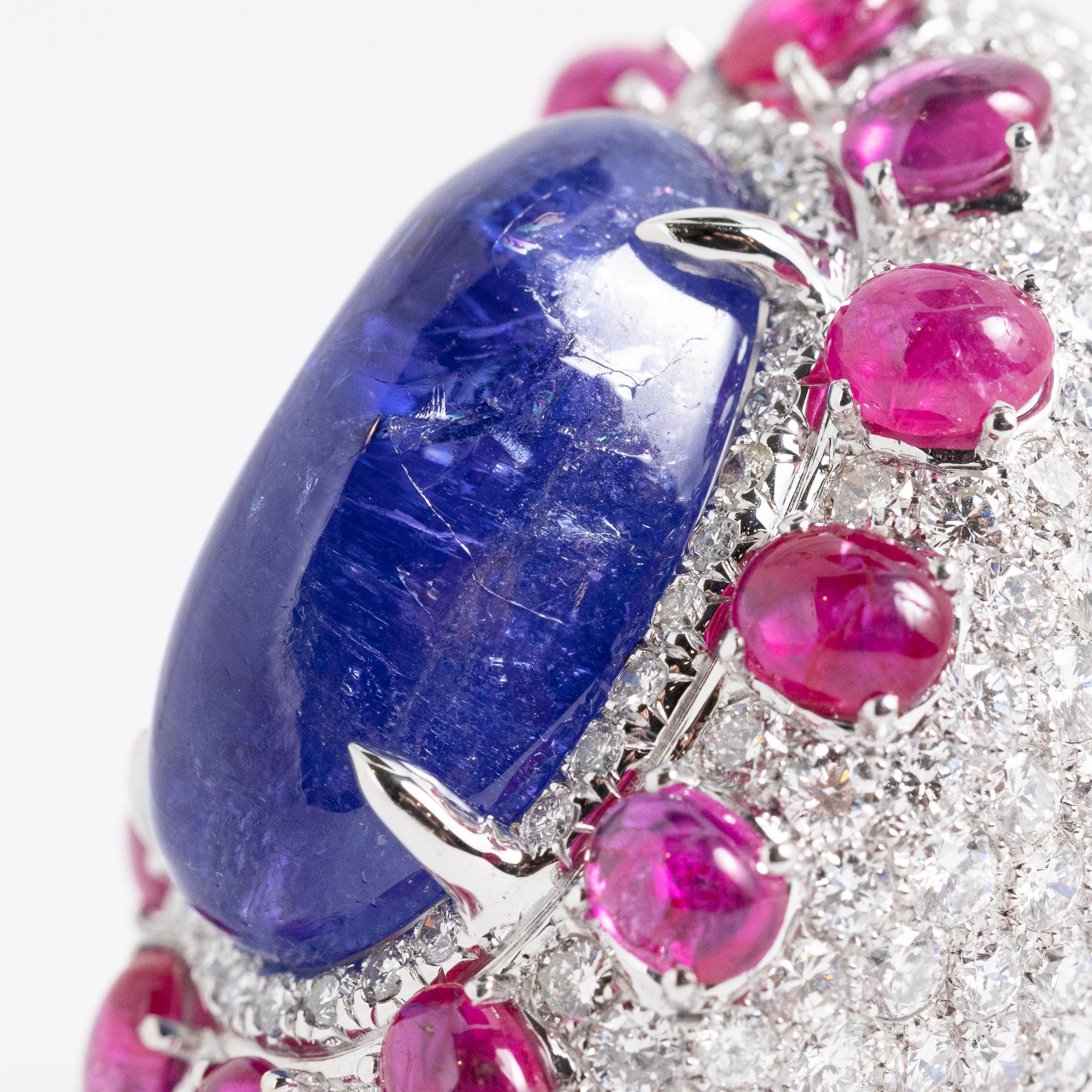 Ring made of 18 kt. white gold with diamonds, rubies and tanzanite signed Fraleoni.
This cocktail ring is part of the Queen Collection and is entirely handmade in Italy.
One of a kind. 
There is a reducer inside the ring to adjust the