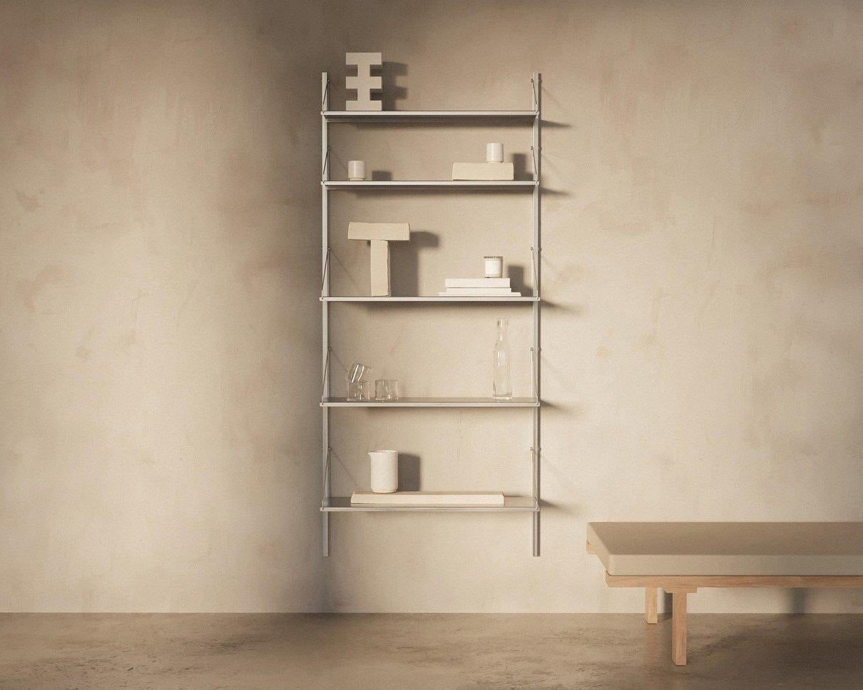 Shelf Library Stainless Steel is a natural extension of Frama’s Shelf Library universe. Characterized by a modular system and fastened with solid steel screws on stainless steel rails, the shelves can be easily placed and re-styled in a variety of