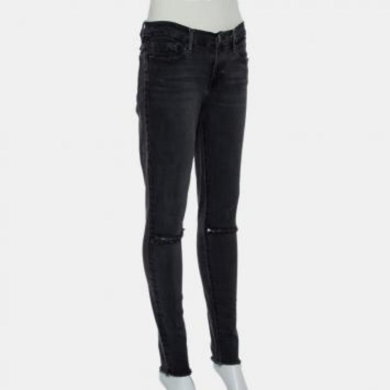 These skinny jeans from Frame are simply fabulous! The black faded denim pair flaunts distressed and slashed knee details and comes equipped with belt loops, a front button and zip fastening, and five pockets. It will look great with simple T-shirts