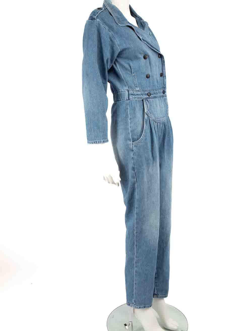 CONDITION is Very good. Minimal wear to jumpsuit is evident. A small hole is seen near one of the front button on this used Frame designer resale item. Please note that the hem finishing is purposely distressed.
 
 Details
 Blue
 Denim
 Jumpsuit
