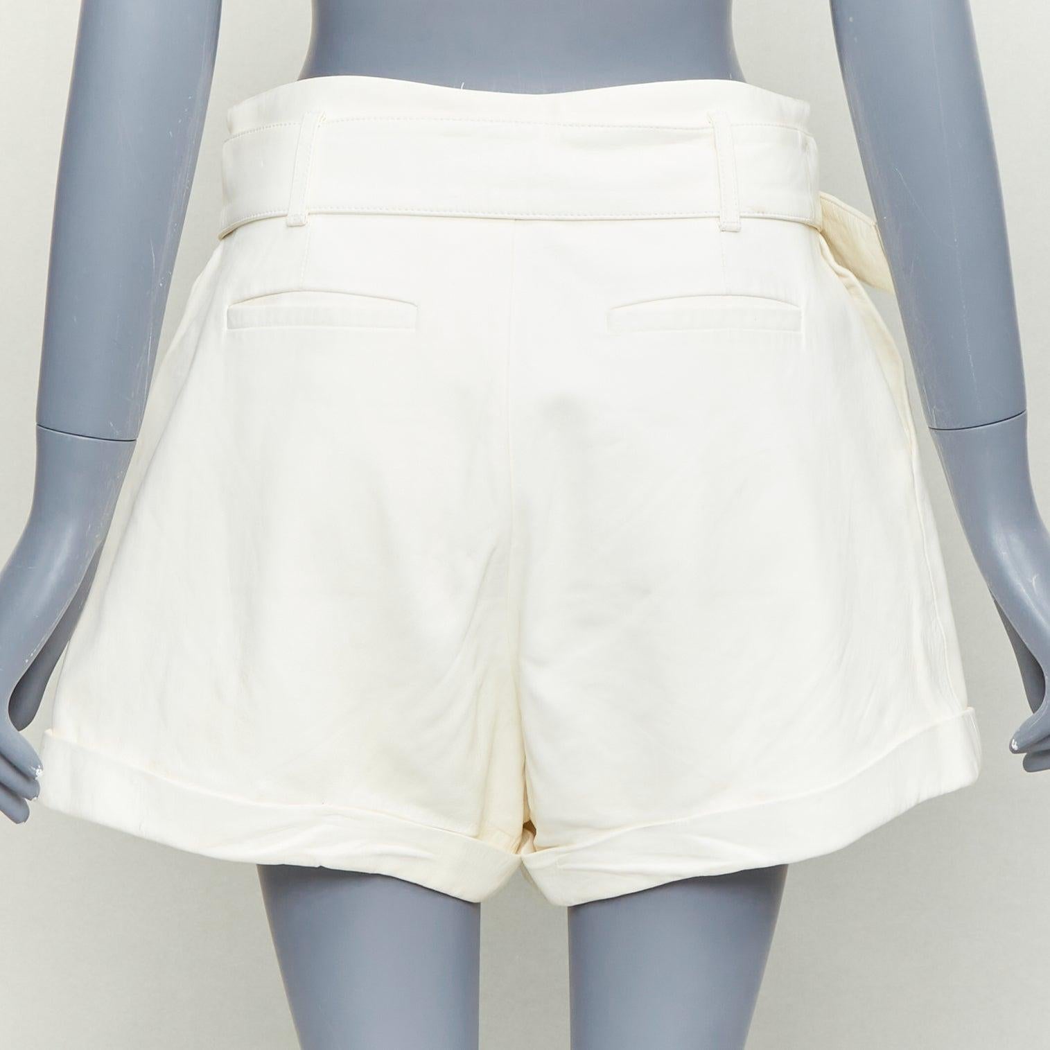 FRAME short en cuir d'agneau crème ceinturé à taille haute 27