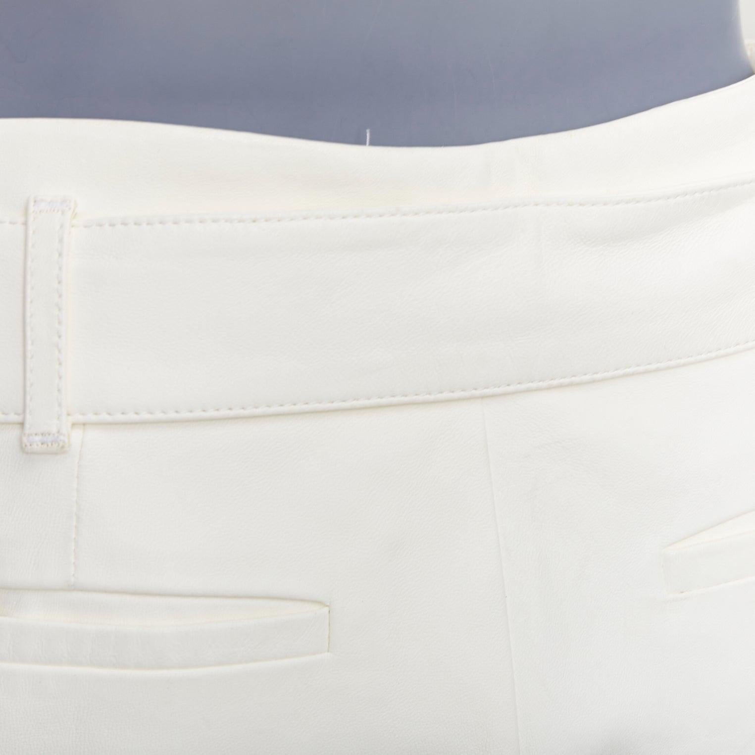 FRAME short en cuir d'agneau crème ceinturé à taille haute 27