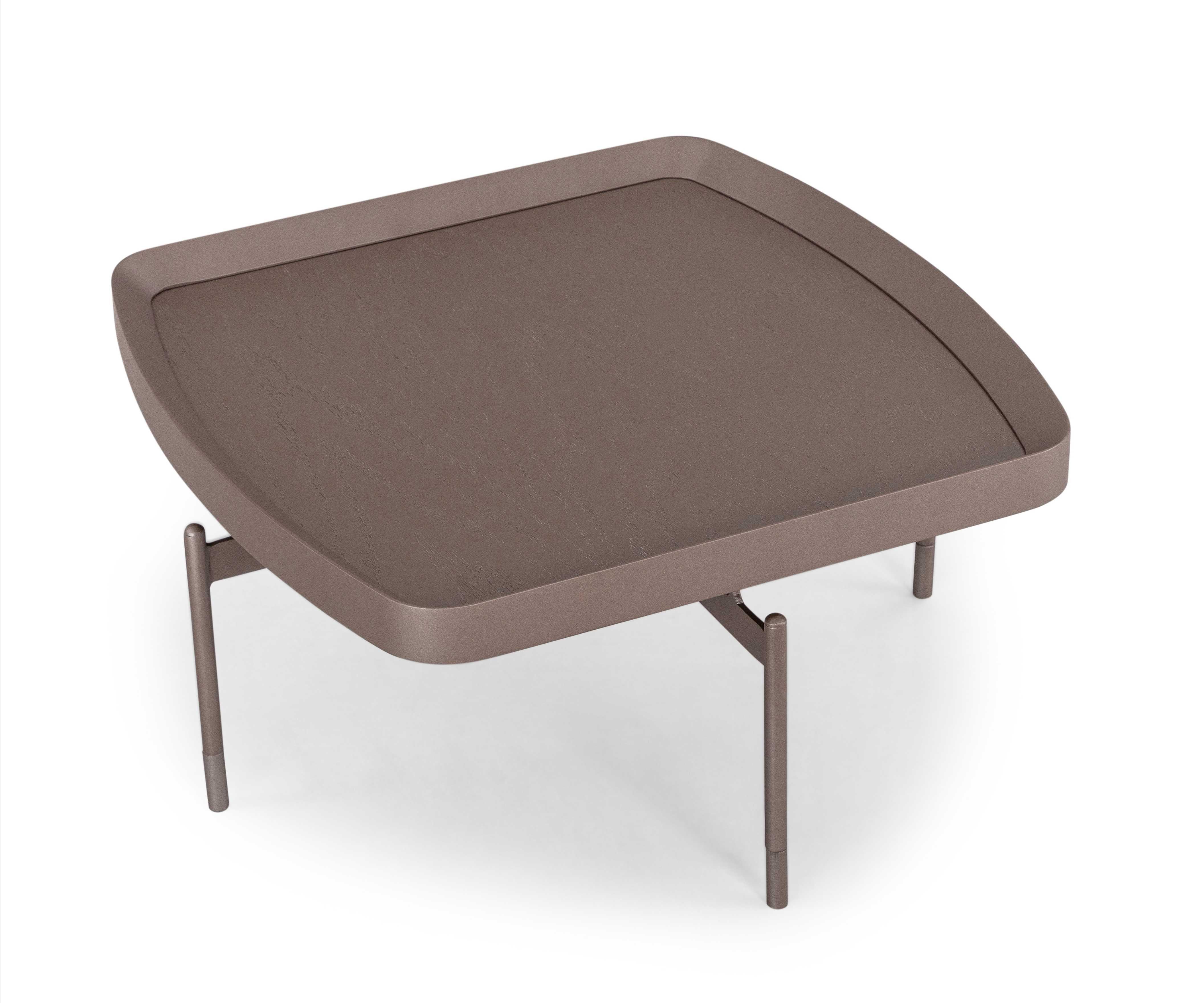 A Frame coffee table designed by Sérgio Batista for Uultis in Chocolate Oak with 24-Inch top. The Frame coffee table is a sophisticated centerpiece, meticulously crafted to bring both style and functionality to your living space. Designed with a