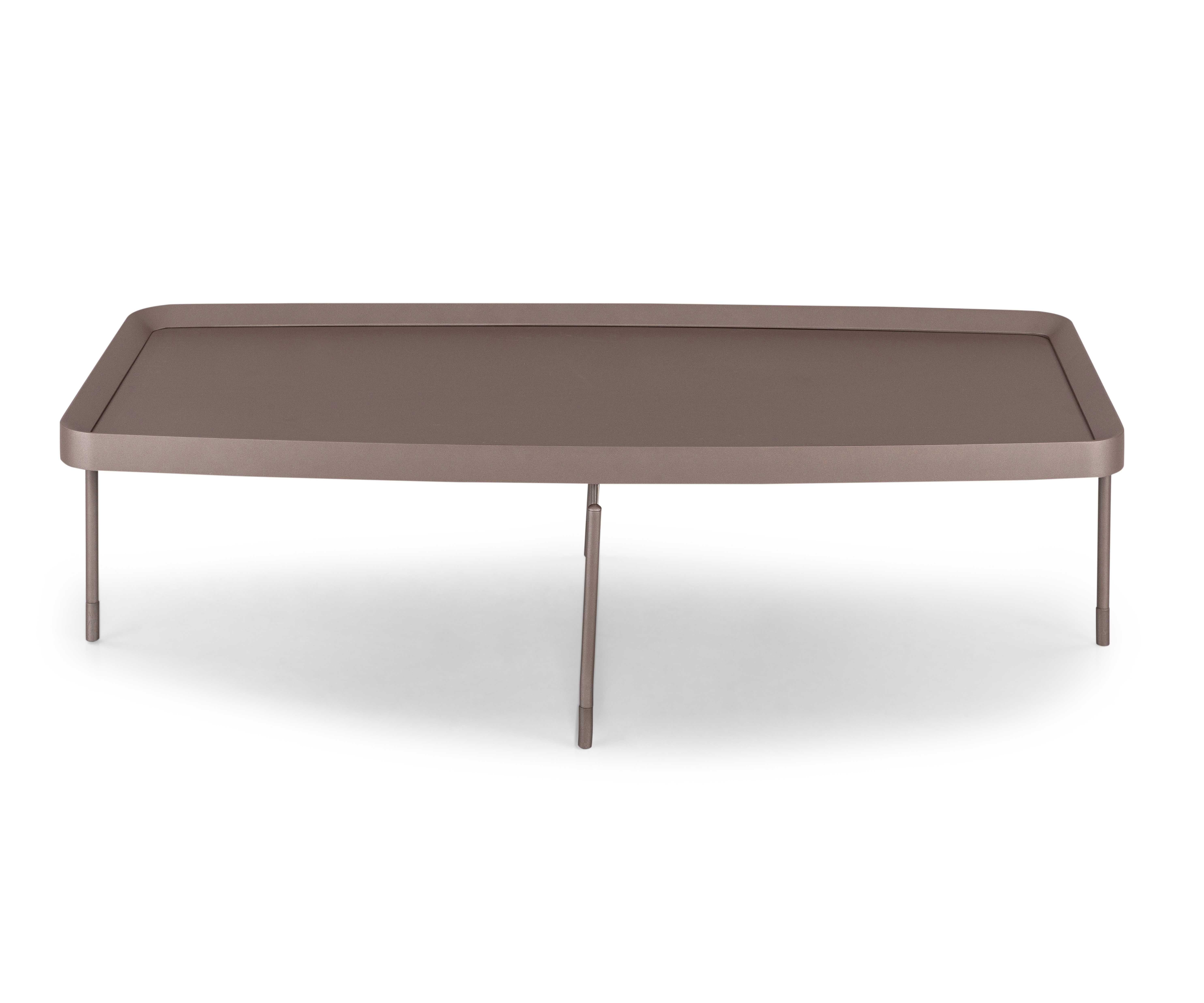The Frame coffee table by Uultis is a refined expression of Brazilian design, merging architectural clarity with natural warmth. Crafted with a 48-inch top in chocolate oak veneer, this table rests on a minimalist chocolate-toned metal